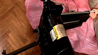 Horny chick rides a fucking machine