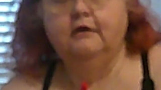 Mature BBW Redhead Nurse Vicki Talks to You as She Makes a Lipstick Applying Video for You!